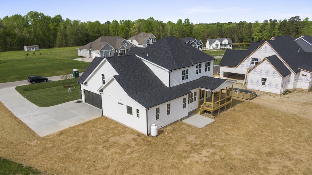 Aerial view of newly constructed homes in a suburban neighborhood